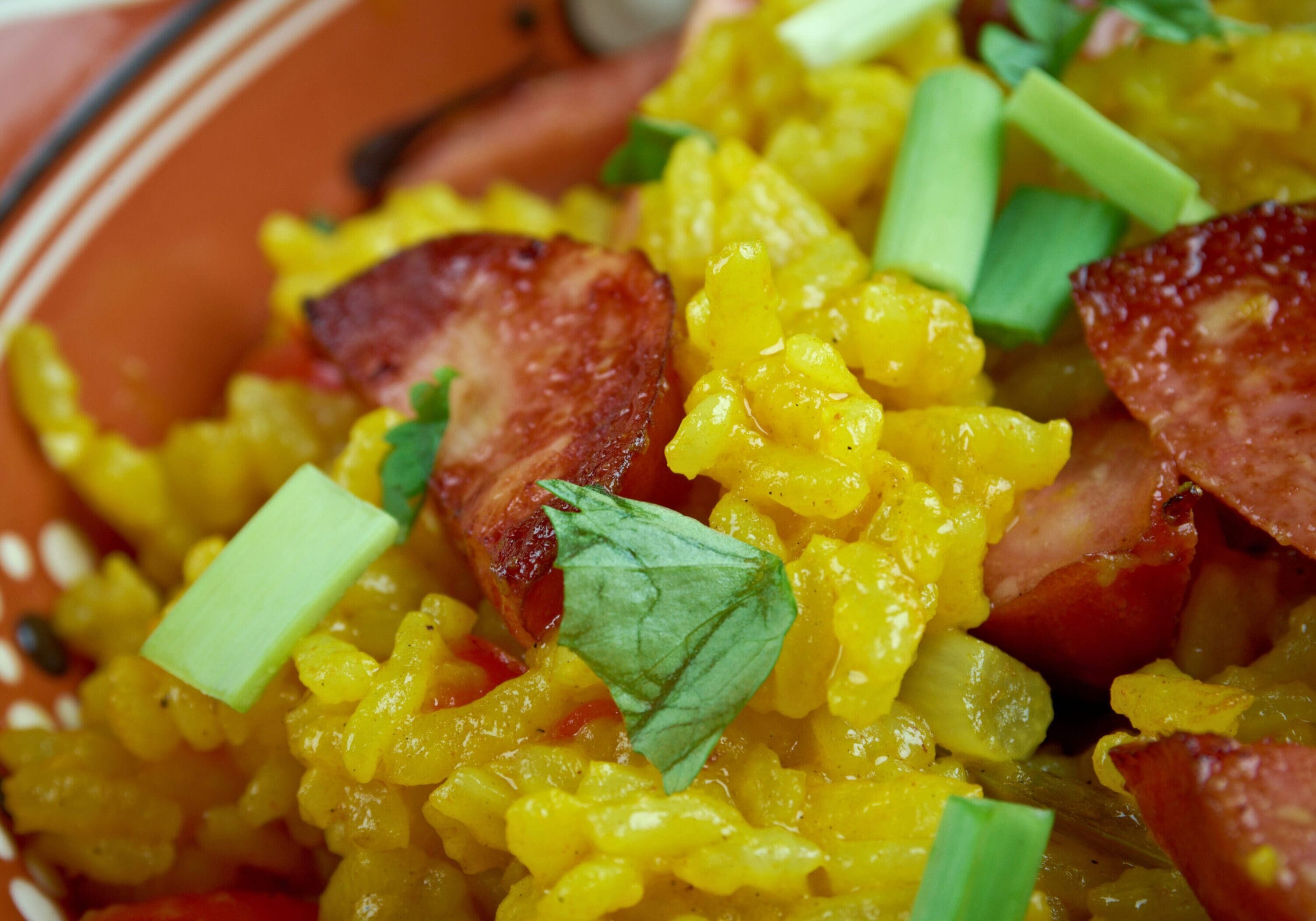 Dirty rice - traditional Creole dish made white rice which  chicken liver or giblets, green bell pepper.most common in the Creole regions of southern Louisiana